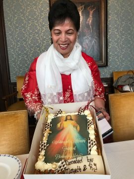 Malou Pimentel of the Divine Mercy apostolate with a special mercy-cake