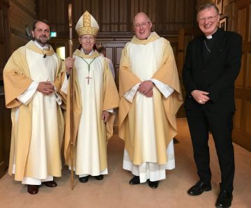 Afscheid en installatie in de Sint Nicolaasbasiliek in Amsterdam