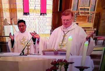 Fr. Ruben Torres concelebrating